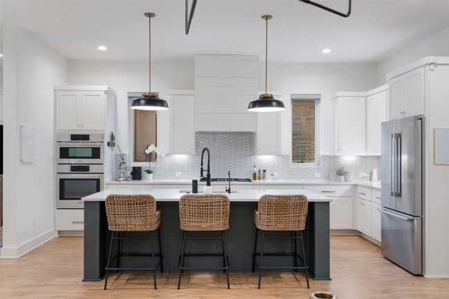 Gourmet kitchen with high ceilings, HUGE walk in pantry and tons of storage. | Image 9