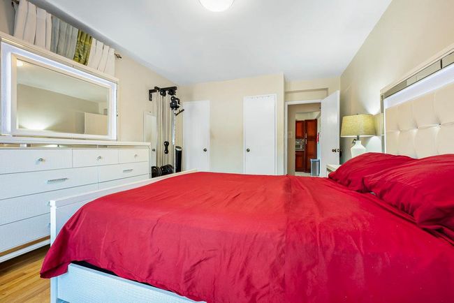 Bedroom featuring wood finished floors | Image 7