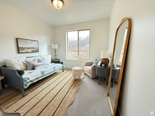 Living area with carpet flooring and baseboards | Image 9