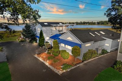 Front of House is inviting with new awnings and beautiful water views | Image 1