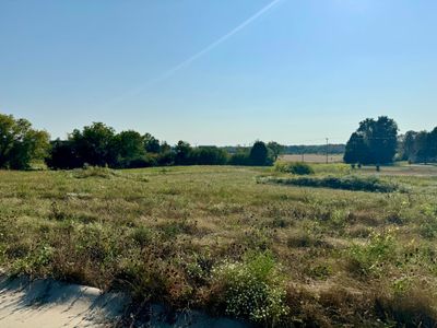 Lot 6 with tree line and view of Vernon marsh and pond area. | Image 2