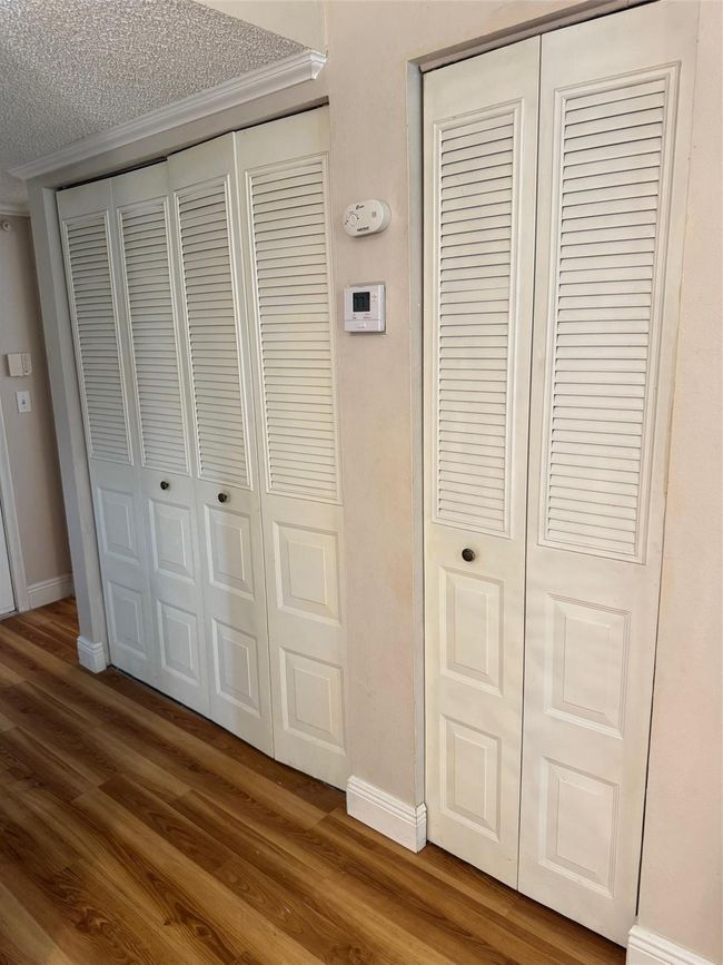closets in hall way | Image 16