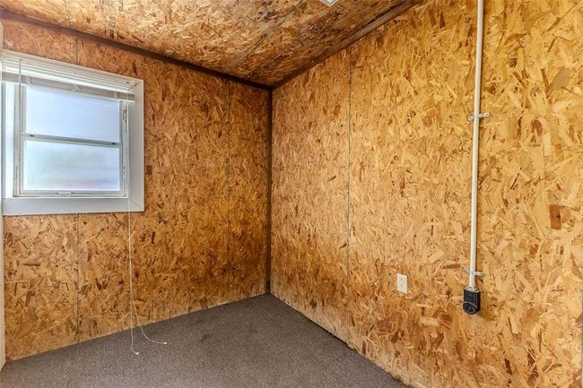 Unfurnished room featuring carpet | Image 53
