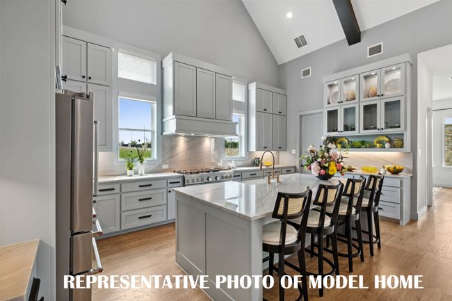 Dream kitchens that all of the chefs in the family will love are plentiful in our homes in Windsong Ranch! REPRESENTATIVE PHOTO OF MODEL HOME | Image 7