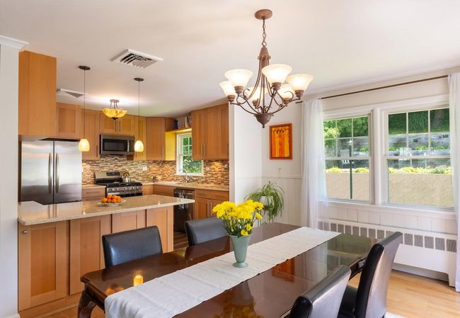 Dining area with view to kitchen | Image 10