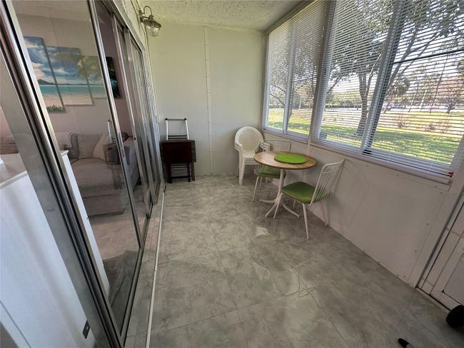 Glass enclosed patio | Image 17