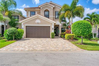 Mediterranean / spanish-style house with a garage | Image 2