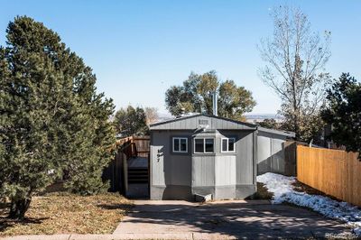 3 Bedroom, 2 Bathroom, single-wide mobile home situated in the well-maintained Cheyenne Mountain Estates Mobile Home Park. | Image 1