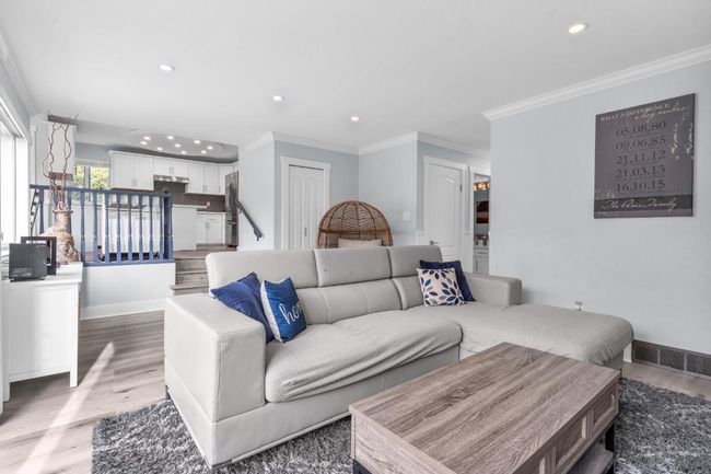 Living room featuring recessed lighting, visible vents, baseboards, and light wood finished floors | Image 14