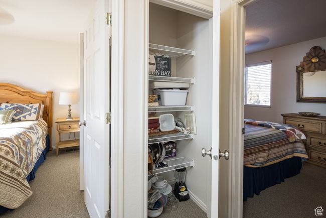 Bedroom with carpet floors | Image 30