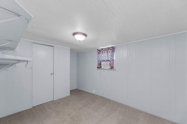 Finished below grade area featuring carpet flooring | Image 26