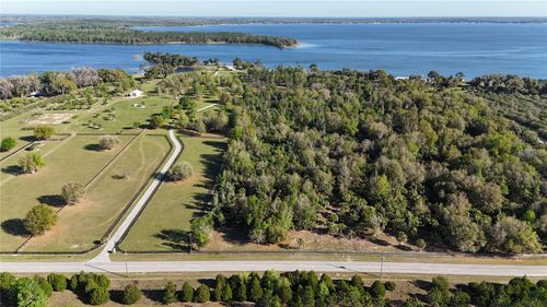 12115 Se Sunset Harbor Rd, Weirsdale, FL, 32195-2330 | Card Image