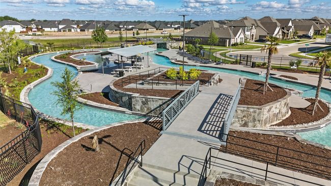 Community pool with a residential view | Image 38