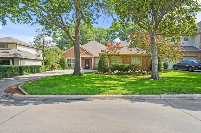 View of front facade with a front yard and concrete driveway | Image 38