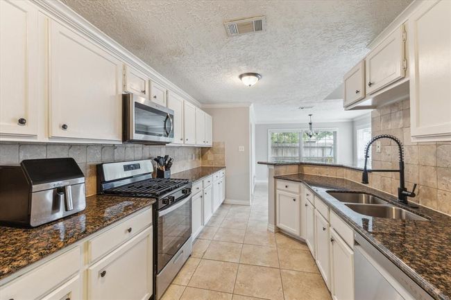 2515 Spring Dusk Ln, House other with 3 bedrooms, 2 bathrooms and 1 parking in Spring TX | Image 9