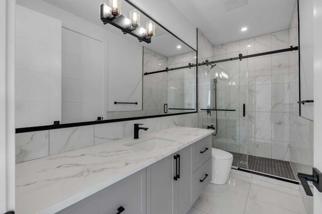 223 Kinniburgh Loop, House other with 4 bedrooms, 4 bathrooms and 5 parking in Chestermere AB | Image 35