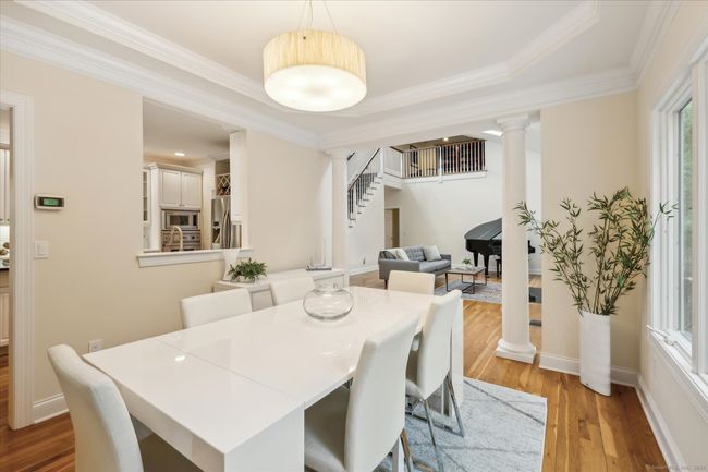 Dining room opens to the large living room. | Image 13