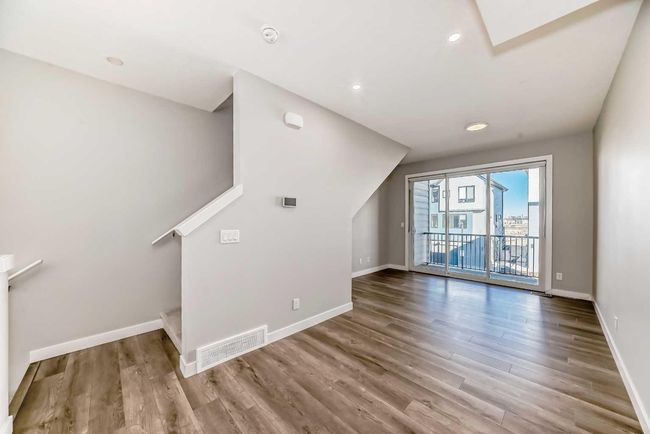 207 Evanscrest Square Nw, Townhouse with 2 bedrooms, 3 bathrooms and 1 parking in Calgary AB | Image 9