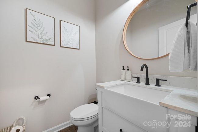 Updated half bath on main level! | Image 19