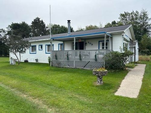 509 Bridge St, East Tawas, MI, 48730-9703 | Card Image