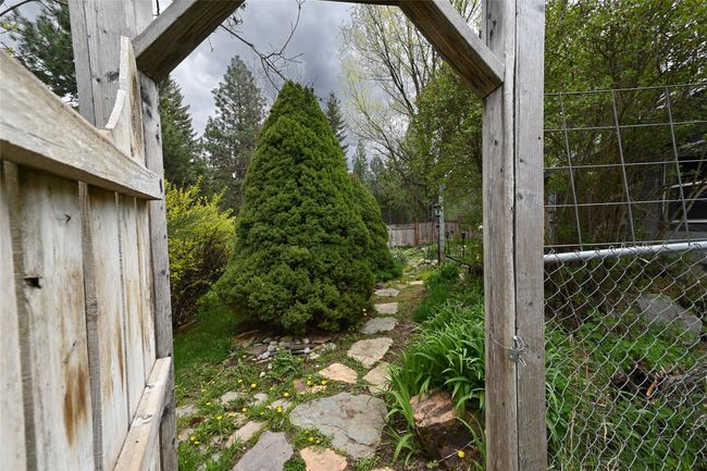 View of yard featuring fence | Image 70