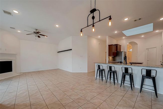 Fully tiled and whole home is hardscape interior | Image 6
