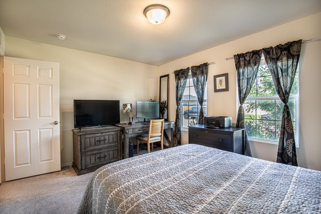 Bedroom with carpet floors | Image 26