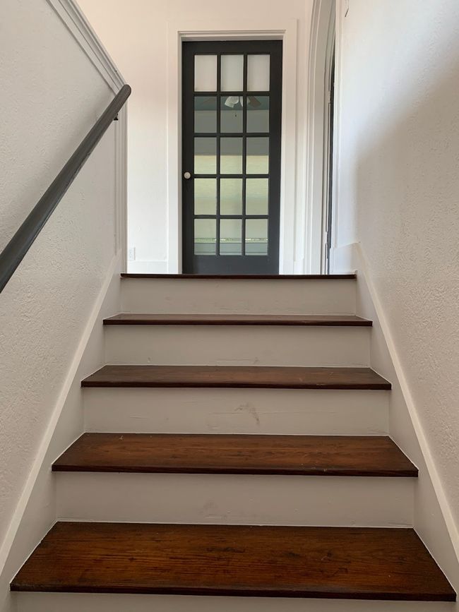 Stairway with a textured wall | Image 4