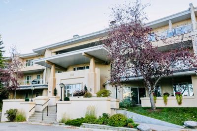 310 - 108 Edgeridge Terr Nw, Condo with 2 bedrooms, 2 bathrooms and 2 parking in Calgary AB | Image 1