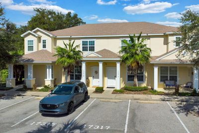 17317 Serenidad Boulevard, Townhouse with 3 bedrooms, 3 bathrooms and null parking in Clermont FL | Image 1