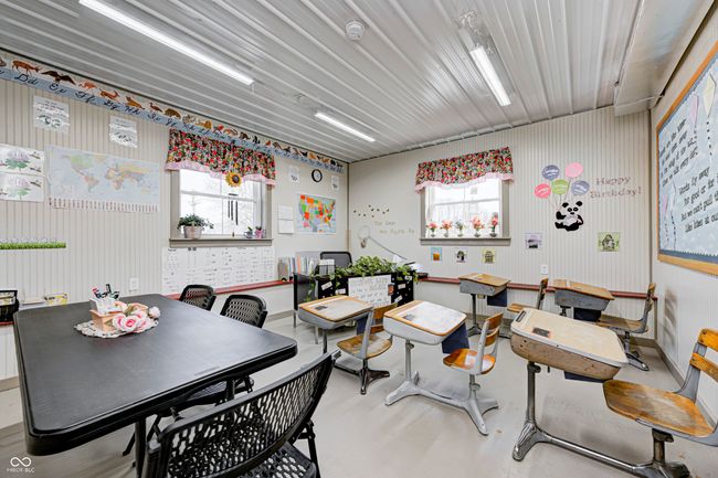 concrete flooring and plenty of natural light | Image 62