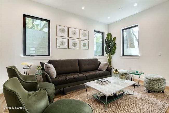 Living room featuring wood finished floors, recessed lighting, and baseboards | Image 11