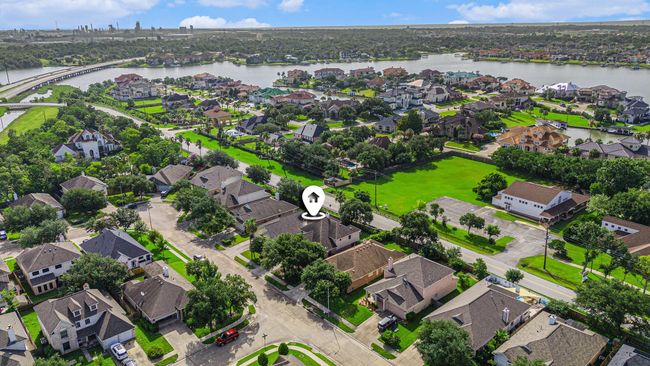 Ariel view of home with Taylor Lake just behind lot. | Image 44