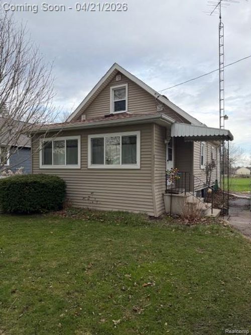 4169 Springfield St, Burton, MI, 48509-1713 | Card Image