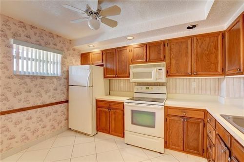 212-8735 Ramblewood Dr, Coral Springs, FL, 33071-7170 | Card Image