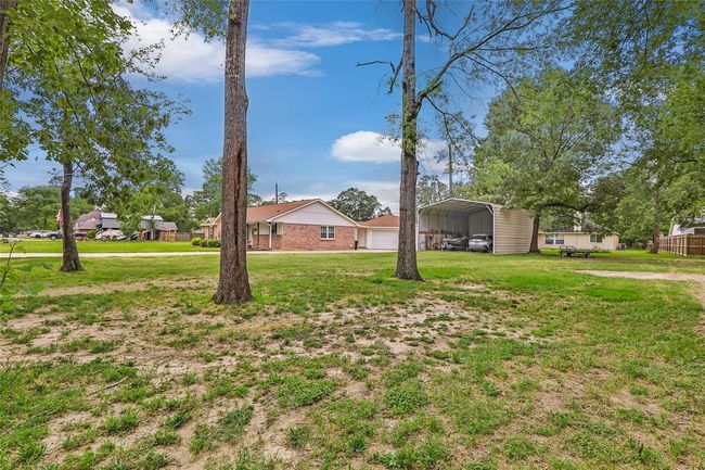 Sold with 2 lots! Additional lot to the left of the home is available for purchase at $60K. | Image 8
