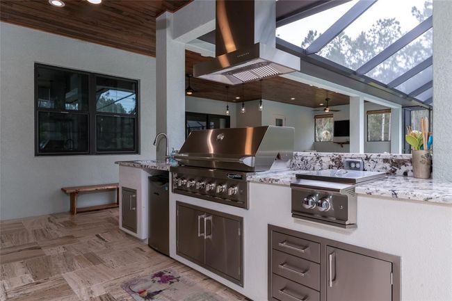 Professional Grade Grand Turbo grill, RCS Pro 60, 000BTU power burner, sink, refrigerator, and built-in storage. | Image 27