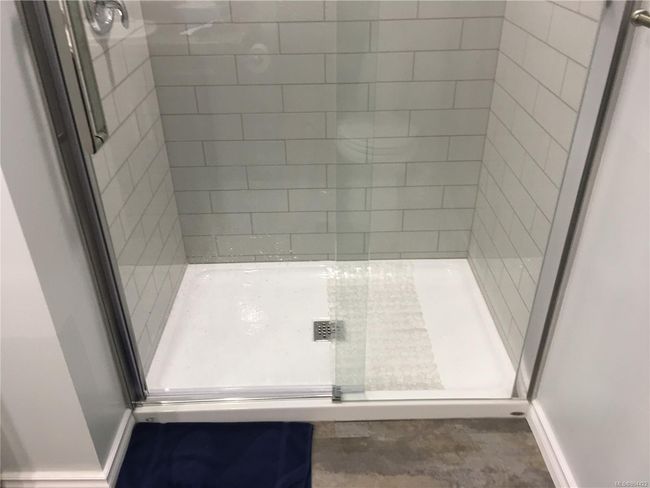 Bathroom with a stall shower | Image 25