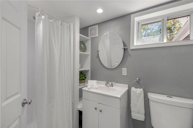 Updated main floor bath w/ walk in shower. | Image 10