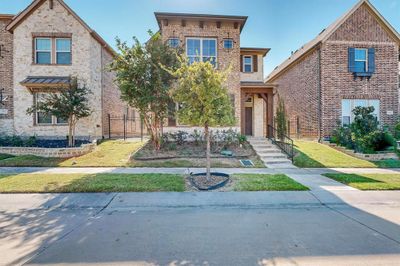 View of front facade with a front lawn | Image 2