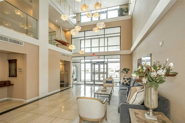 Lobby featuring a towering ceiling | Image 23