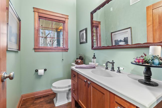 Half bath off main hallway across from kitchen | Image 16