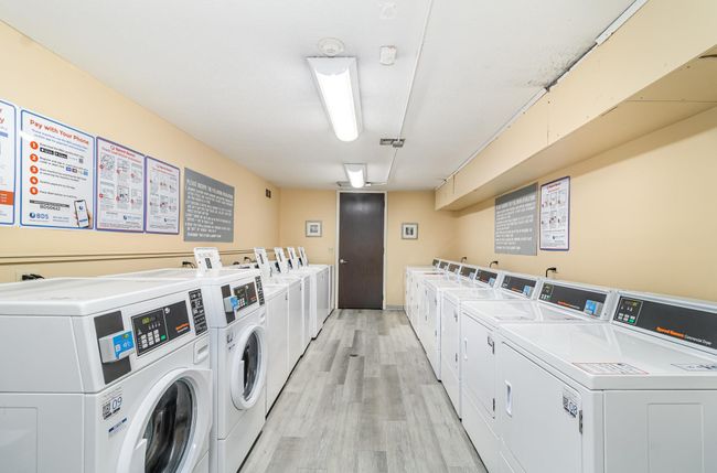 Laundry is located just a few doors away from the unit | Image 14