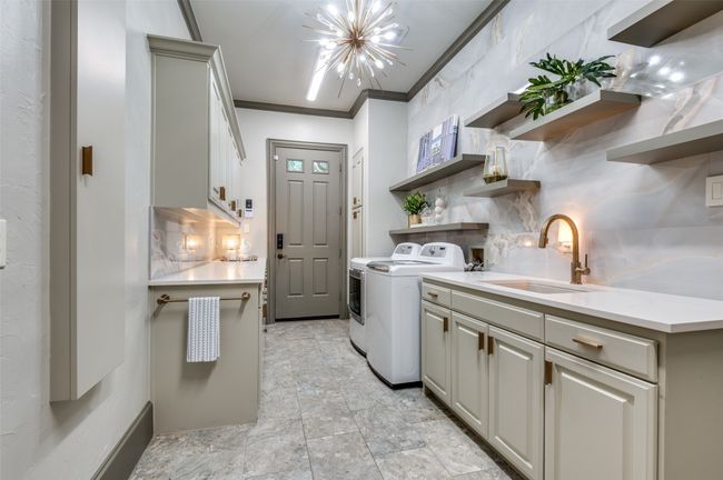 Who would mind doing laundry in this room? | Image 24