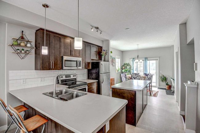 3 Redstone Circle Ne, Home with 3 bedrooms, 2 bathrooms and 2 parking in Calgary AB | Image 8