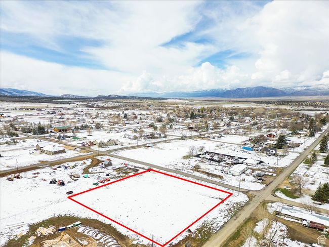 Snowy aerial view with a mountain view | Image 6