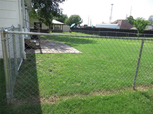 View of yard featuring fence | Image 18