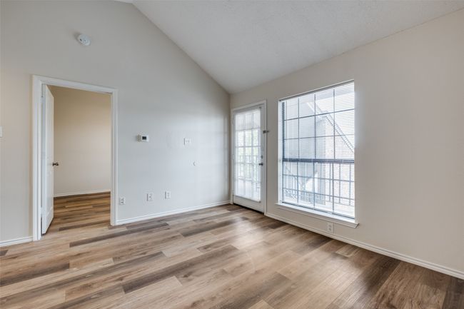Back door to patio, & door to bedroom | Image 10