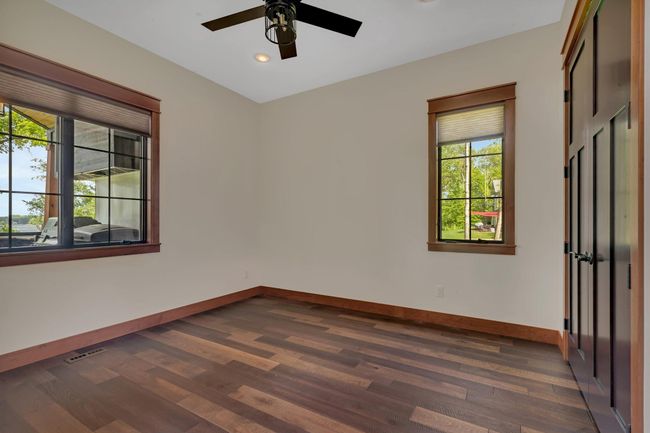 Your guest will appreciate a full lake view from the main floor guest room! | Image 58