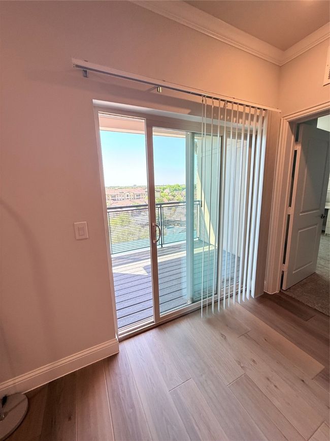 View of 4th floor patio off the living room | Image 10